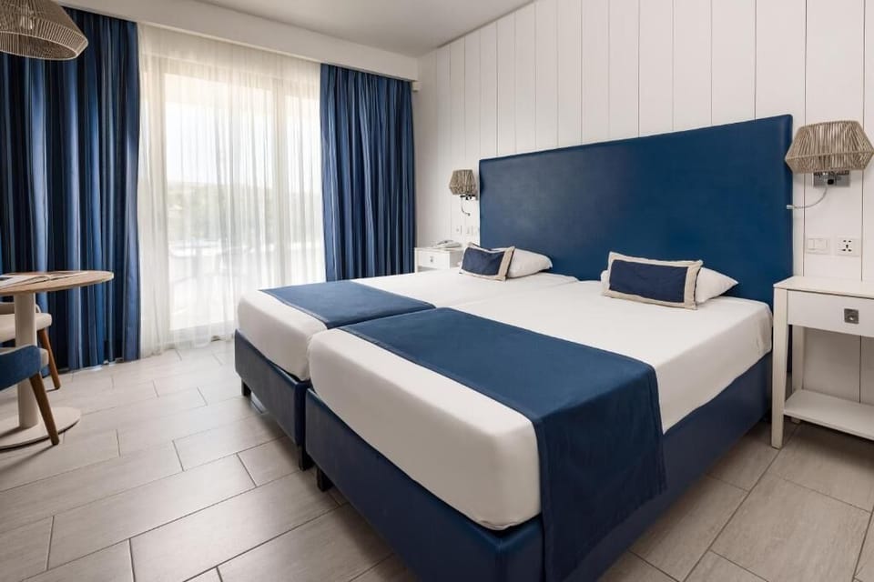Down comforters, minibar, in-room safe, desk