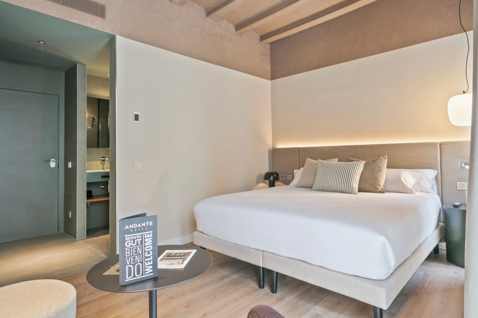 Double Room | Minibar, in-room safe, laptop workspace, blackout drapes
