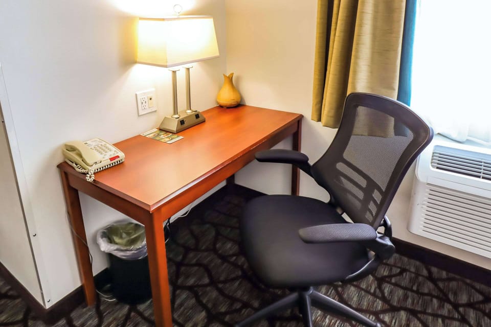 Premium bedding, desk, blackout drapes, iron/ironing board