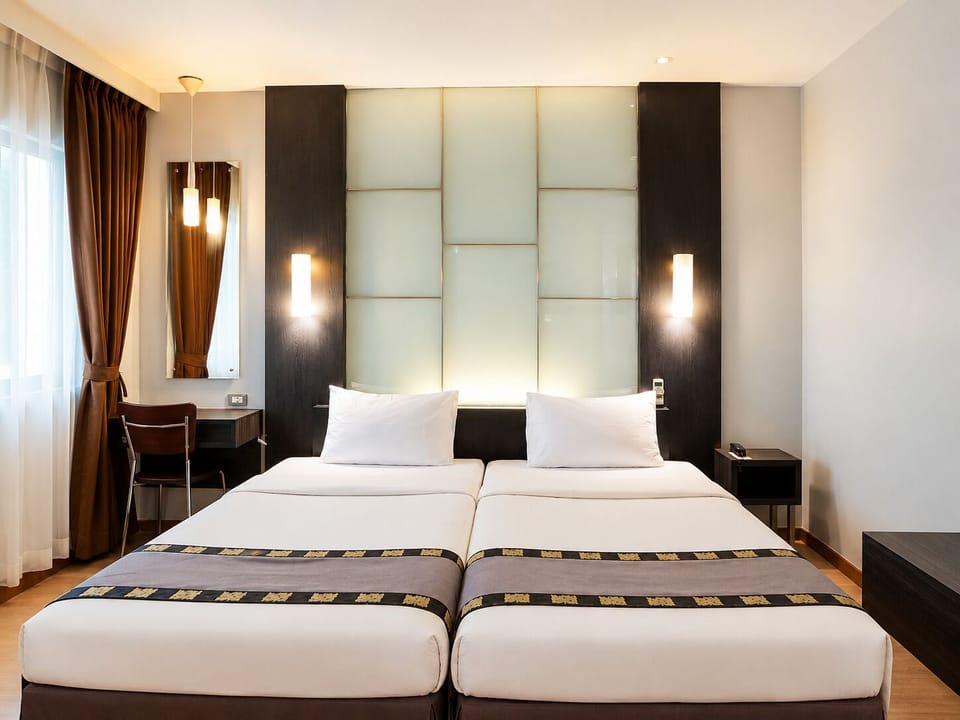 Deluxe Room, 2 Twin Beds | Minibar, in-room safe, desk, laptop workspace