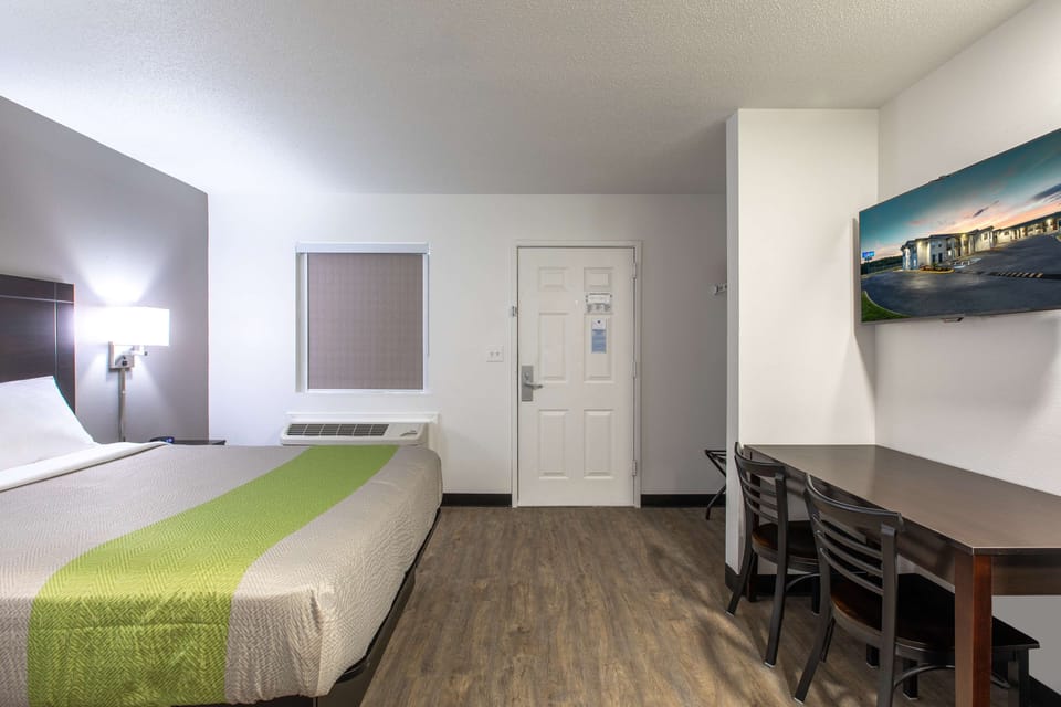 Premium bedding, pillowtop beds, desk, laptop workspace