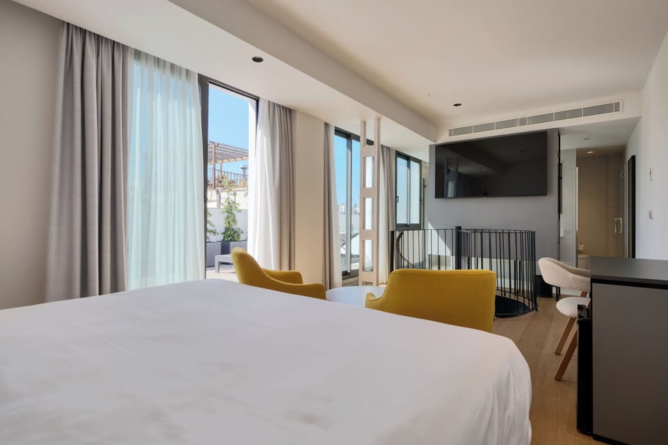 Deluxe Room, Terrace with Jacuzzi | Free minibar items, in-room safe, desk, laptop workspace