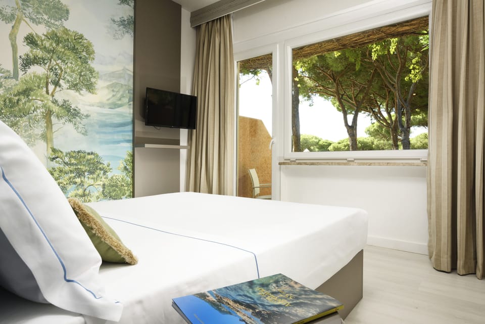 Junior Triple Room | Down comforters, in-room safe, individually decorated, desk