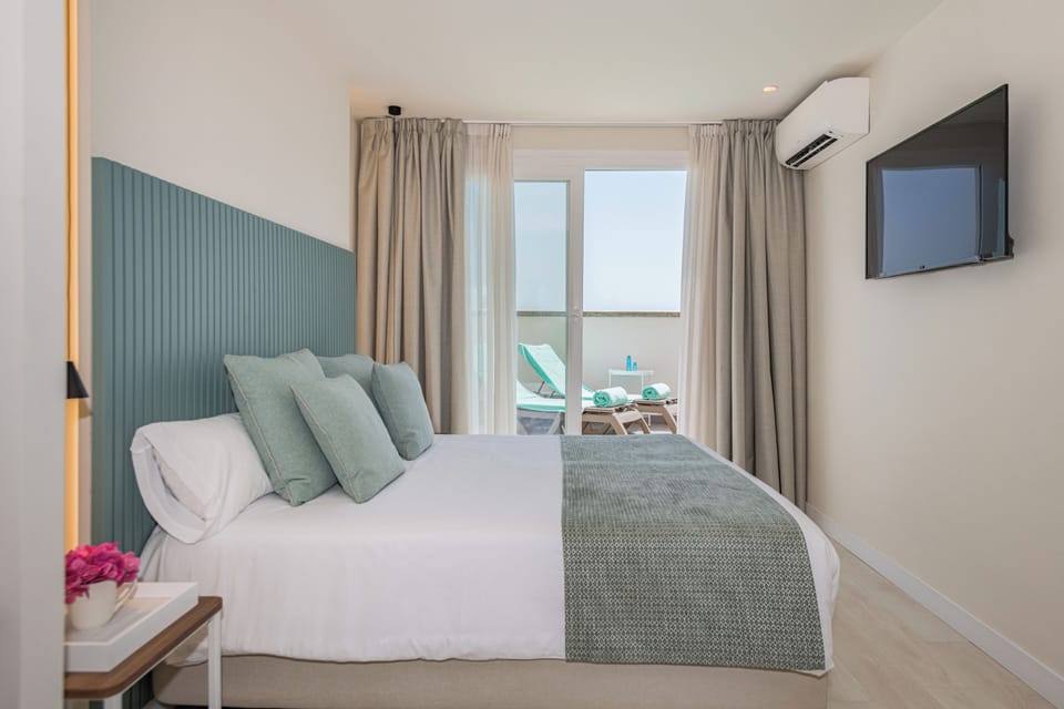 Junior Suite, Terrace | In-room safe, free WiFi, bed sheets
