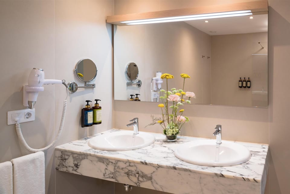 In-room safe, blackout drapes, WiFi (free), bed sheets