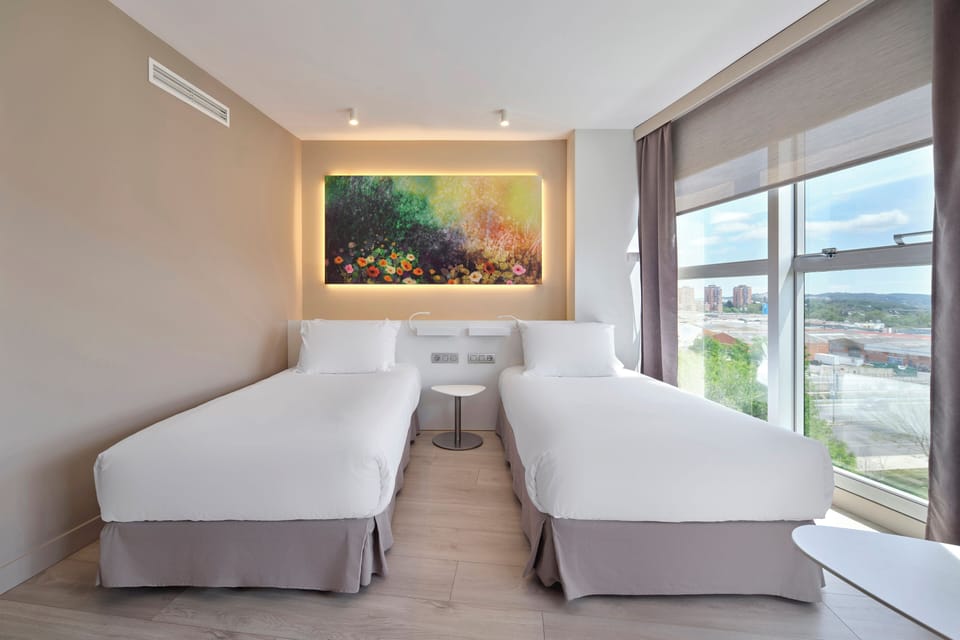 Twin Room | Down comforters, minibar, in-room safe, desk