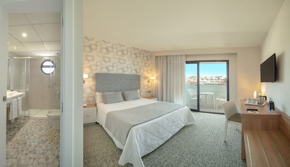 Minibar, desk, iron/ironing board, free WiFi