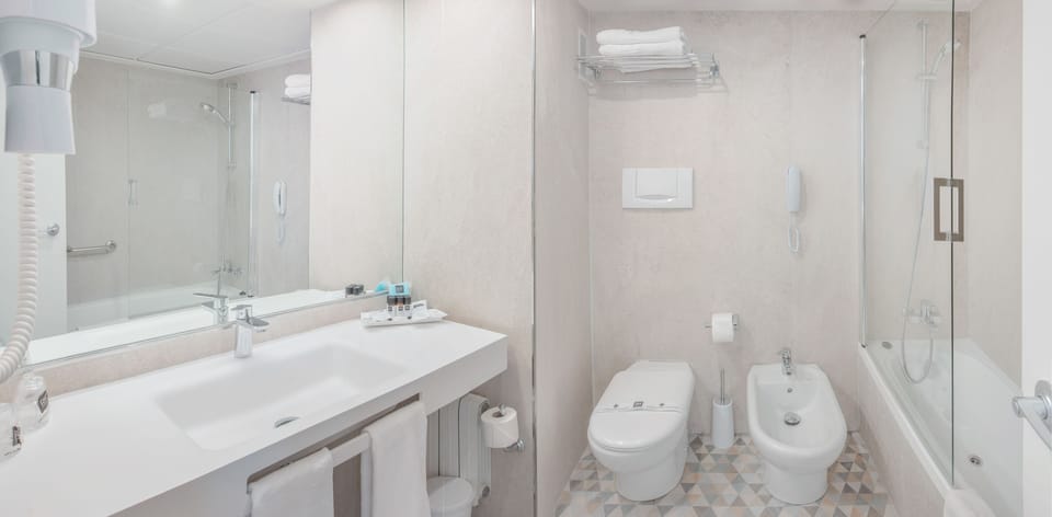 Free toiletries, hair dryer, bidet, towels