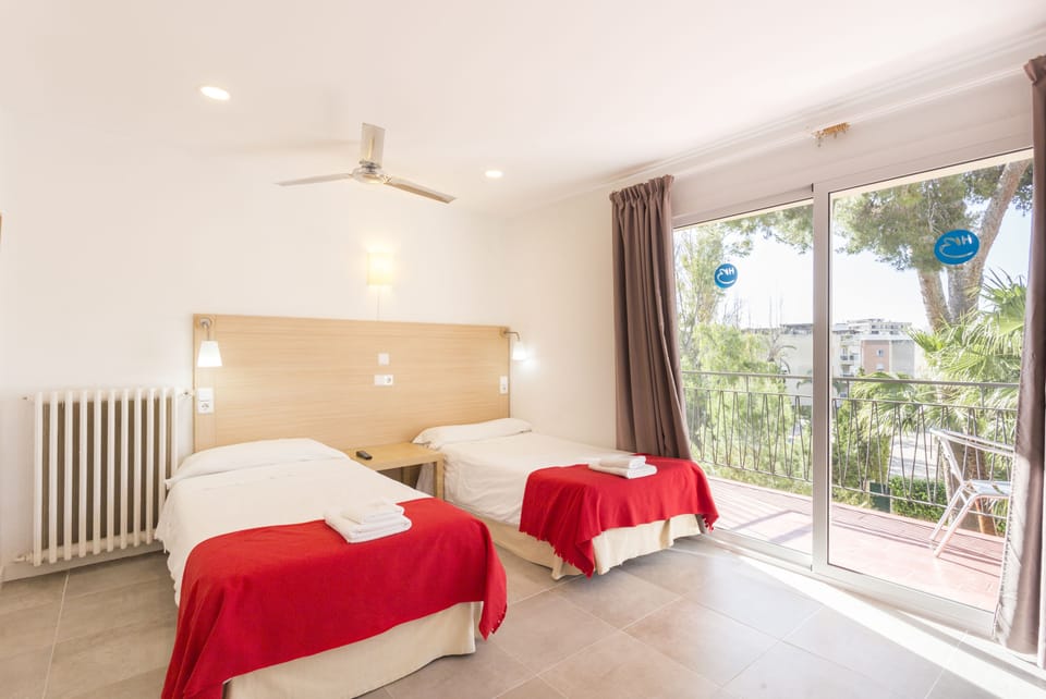 Grand Twin Room, Pool View | Desk, laptop workspace, blackout drapes, iron/ironing board