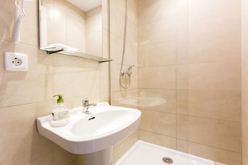 Double Room Single Use, Balcony | Bathroom | Shower, free toiletries, hair dryer, towels