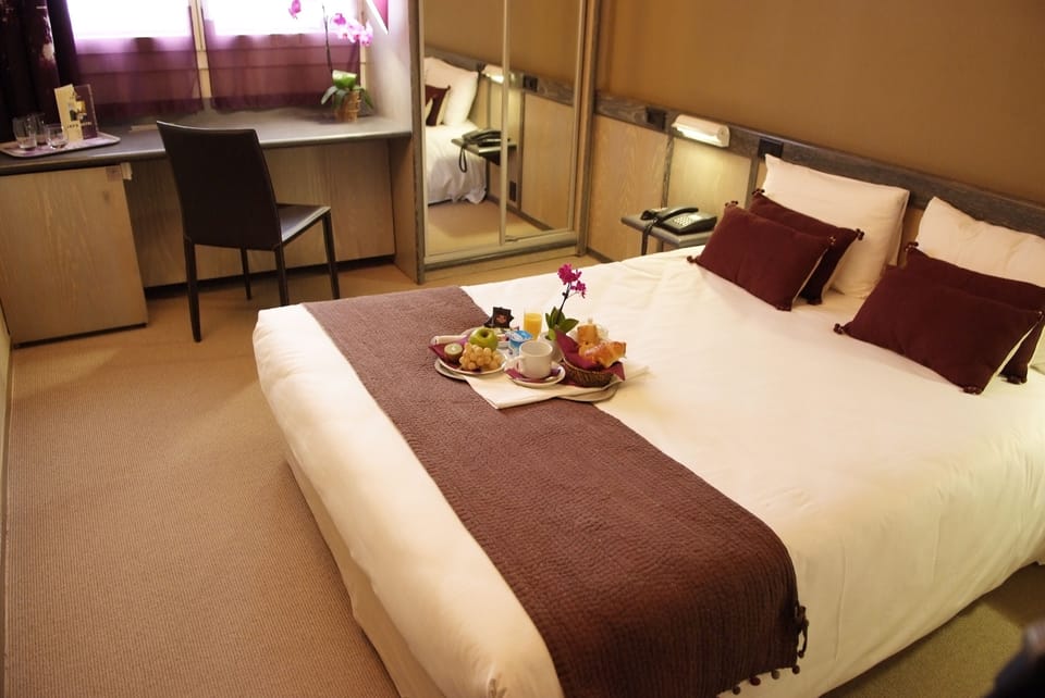 Premium bedding, desk, laptop workspace, soundproofing