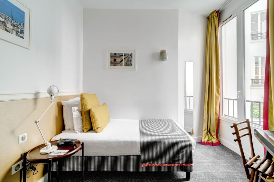 Single Room - Complimentary soft minibar,courtesy tray, Chromecast, digital press | Minibar, in-room safe, desk, blackout drapes