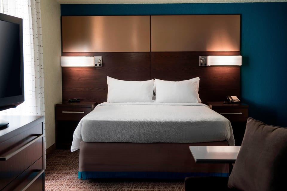 Hypo-allergenic bedding available, down comforters, desk