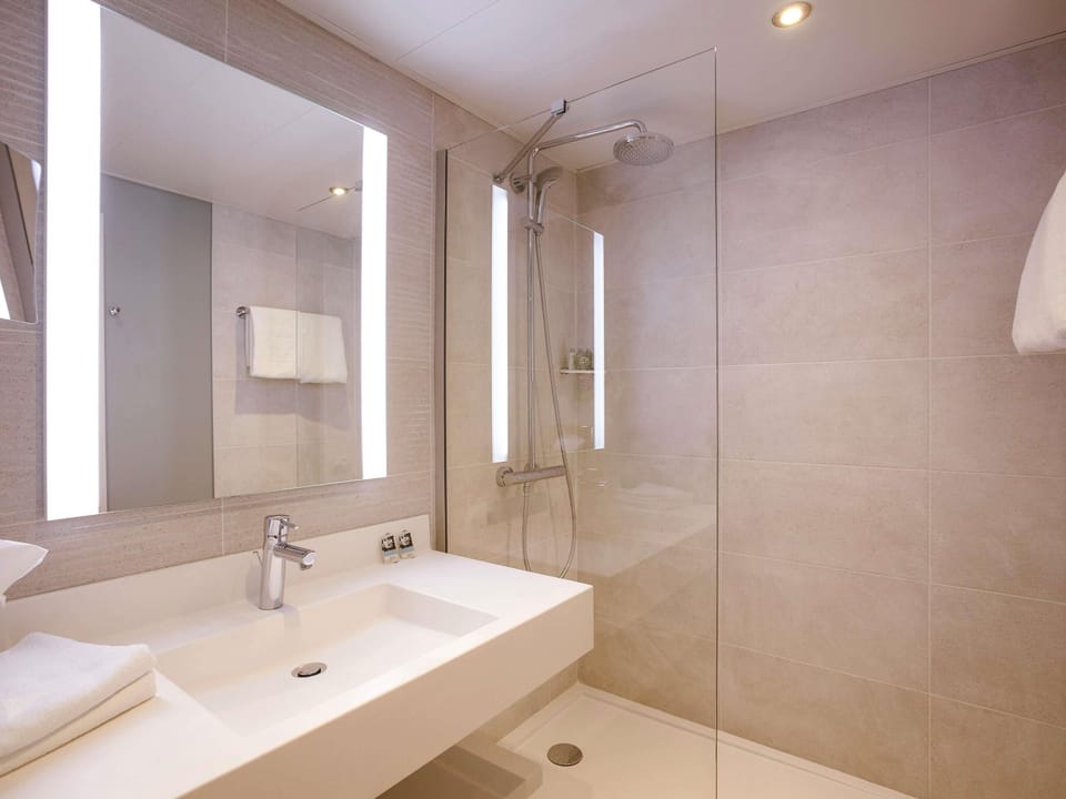 Eco-friendly toiletries, hair dryer, towels, soap