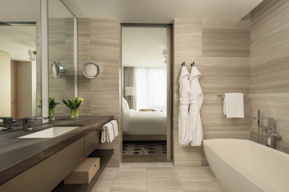 Combined shower/tub, designer toiletries, hair dryer, bathrobes