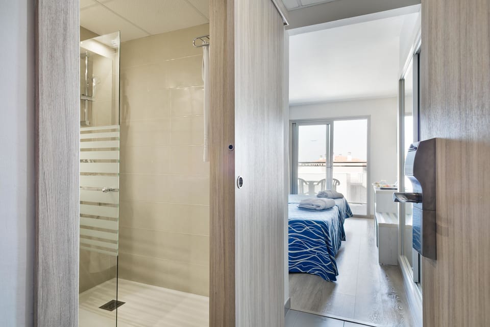 In-room safe, desk, WiFi (free), bed sheets
