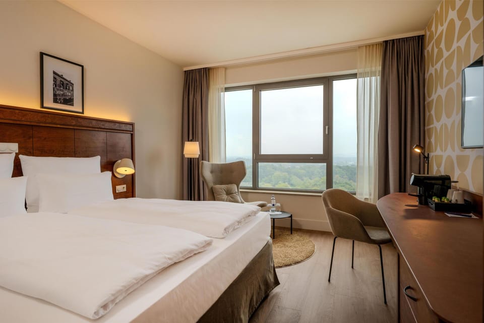 Hypo-allergenic bedding, in-room safe, desk, laptop workspace