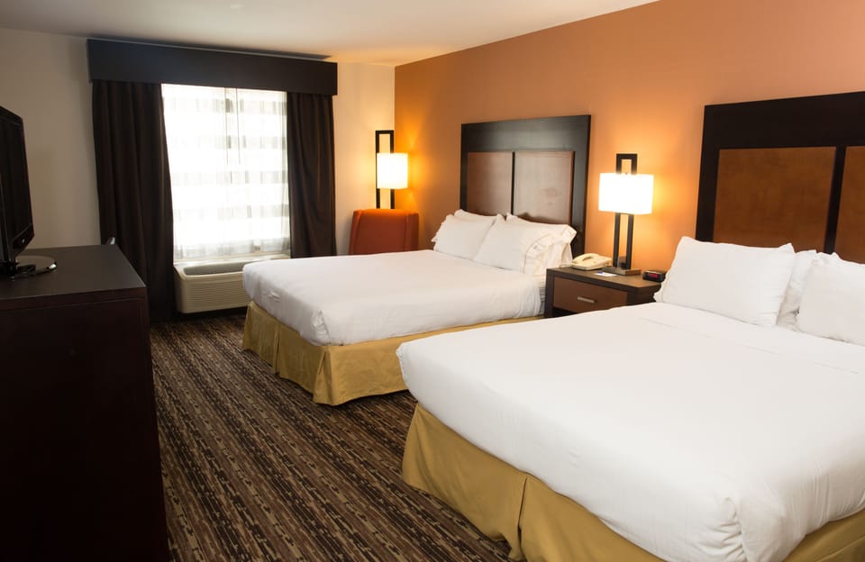 In-room safe, desk, iron/ironing board, free cribs/infant beds