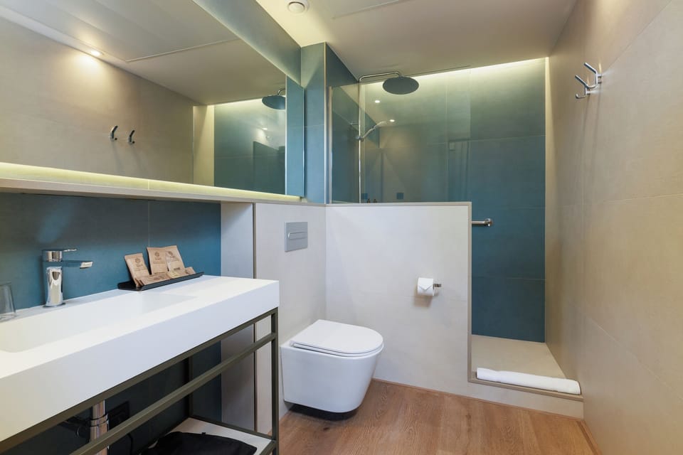 Shower, rainfall showerhead, eco-friendly toiletries, hair dryer