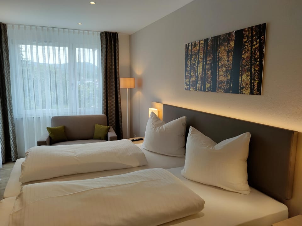 Superior Plus Room  A main building | Down comforters, desk, laptop workspace, blackout drapes