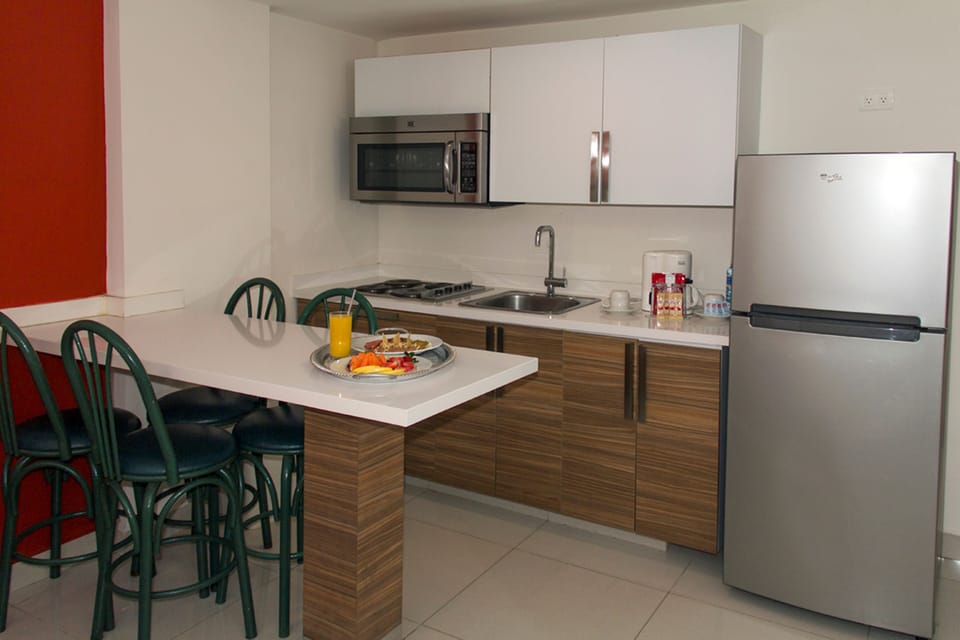 Standard Room, 2 Double Beds, Kitchenette | Private kitchen | Coffee/tea maker, full-size fridge, microwave