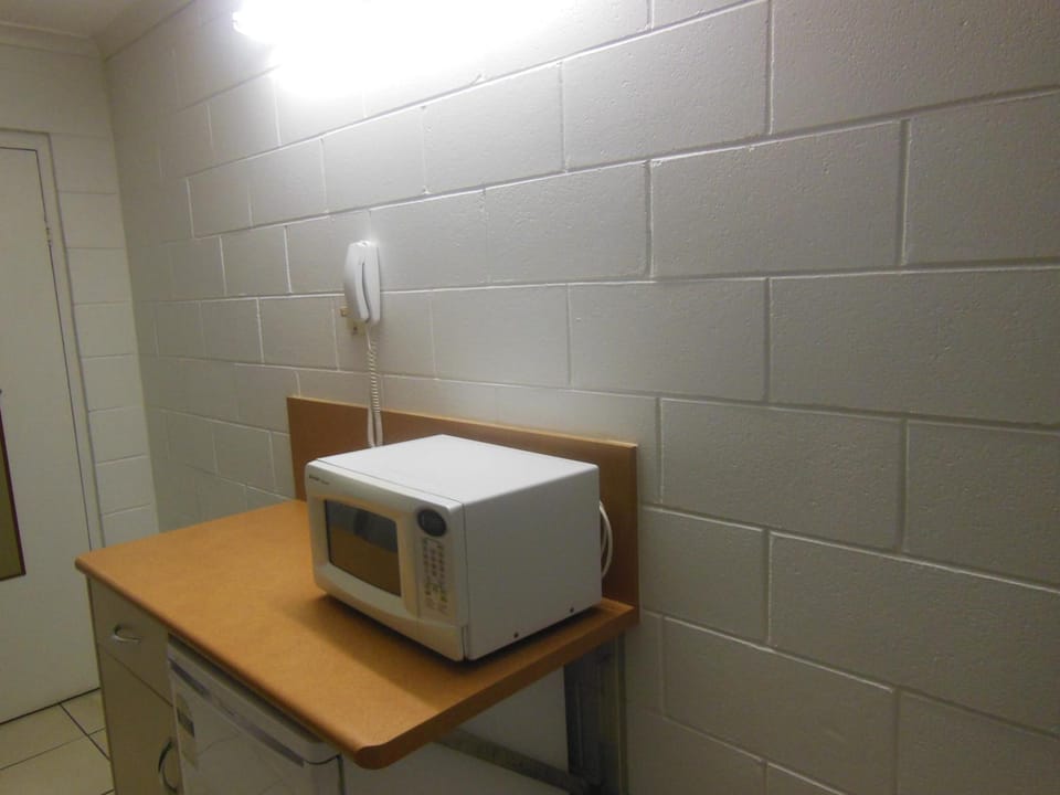 Mini-fridge, microwave, electric kettle, toaster