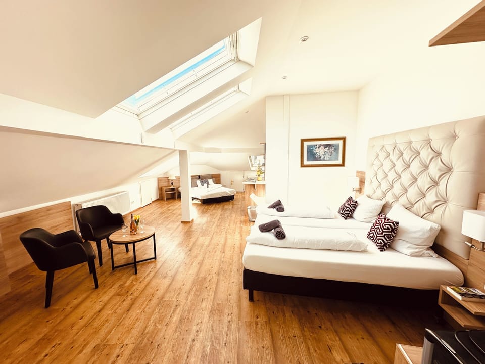 Attic Triple Room | Hypo-allergenic bedding, minibar, in-room safe, desk