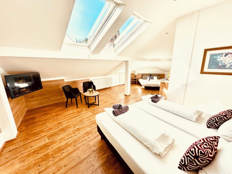 Attic Triple Room | Hypo-allergenic bedding, minibar, in-room safe, desk