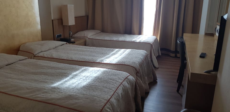 Standard Triple Room | Premium bedding, down comforters, minibar, in-room safe