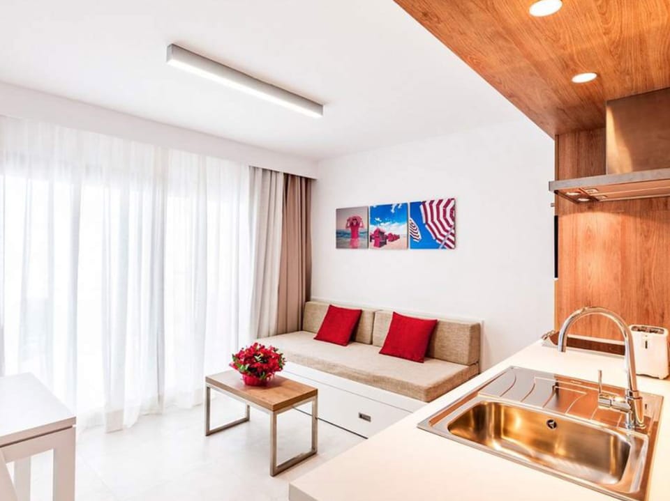 Superior Apartment, 1 Bedroom, Balcony | Living area | 42-inch flat-screen TV with satellite channels, TV