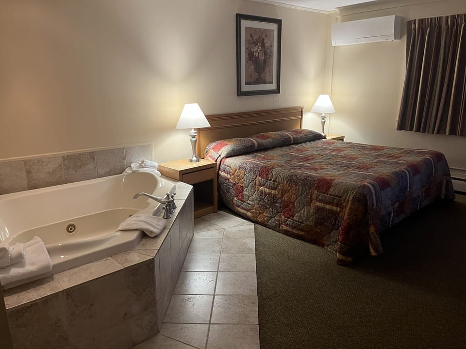 Romantic Room, 1 Bedroom, Jetted Tub - Non-Pet Friendly | 1 bedroom, desk, iron/ironing board (on request), WiFi (free)