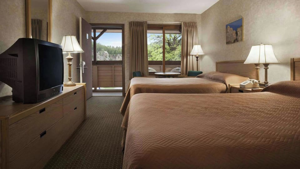 Room, 2 Queen Beds, Non Smoking, Private Bathroom | 1 bedroom, desk, laptop workspace, blackout drapes
