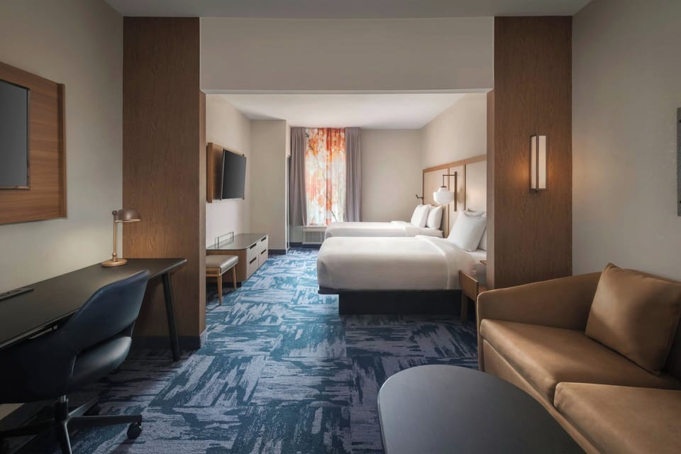 Hypo-allergenic bedding, in-room safe, desk, laptop workspace