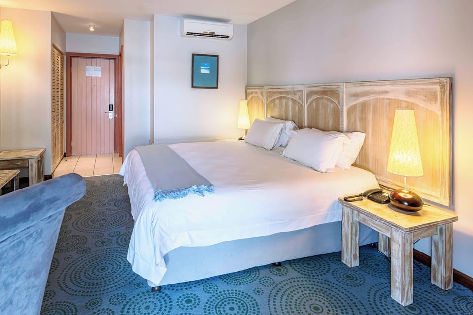 Premium bedding, down comforters, in-room safe, desk