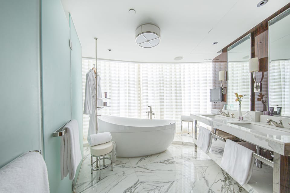 Executive Suite, 1 Bedroom | Bathroom | Separate tub and shower, deep soaking tub, rainfall showerhead
