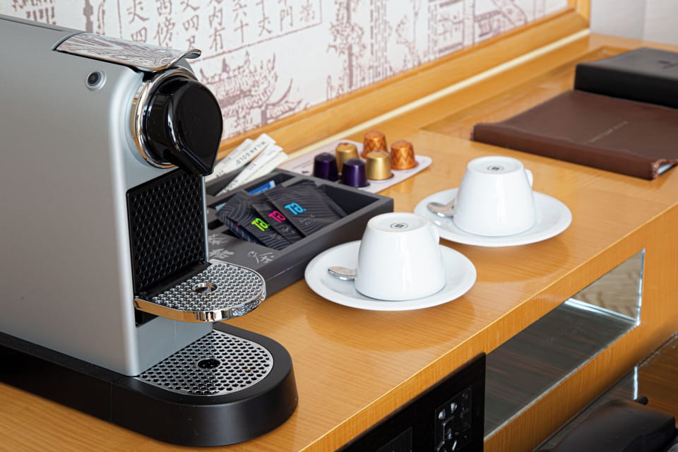 Premium bedding, down comforters, minibar, in-room safe