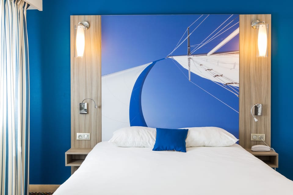 Premium bedding, pillowtop beds, desk, blackout drapes