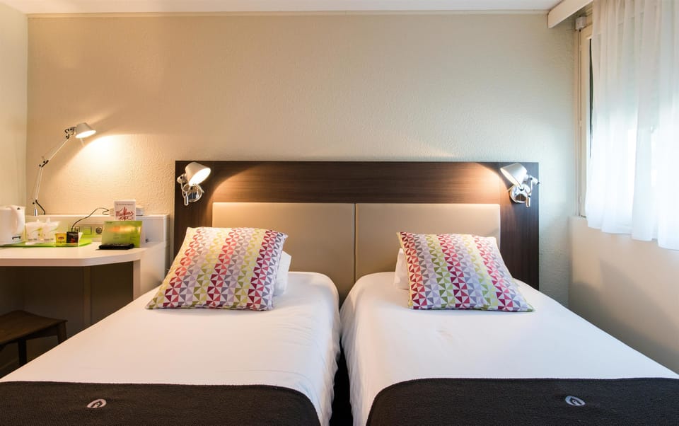 Standard Room, 2 Twin Beds | Premium bedding, individually decorated, individually furnished, desk