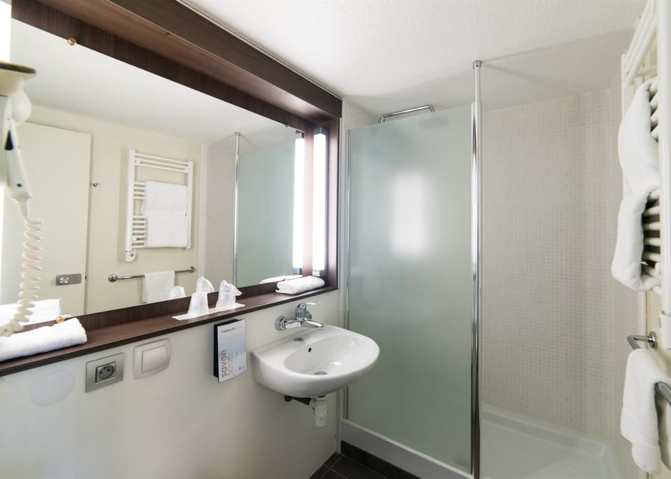 Eco-friendly toiletries, hair dryer, towels, soap