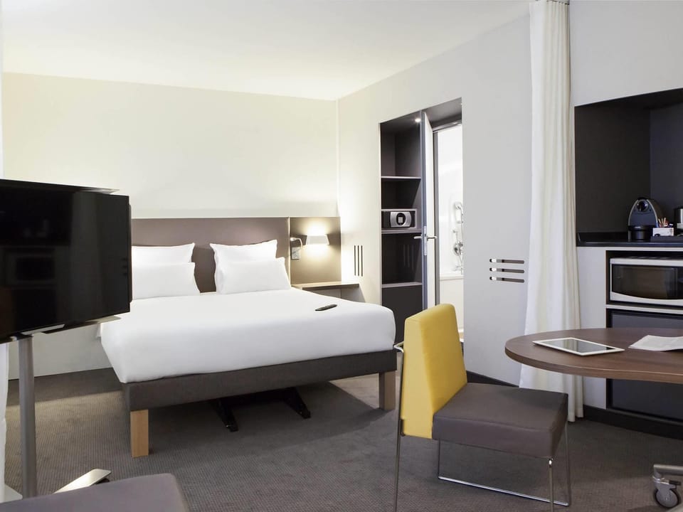 Executive Suite, Multiple Beds | In-room safe, desk, blackout drapes, soundproofing