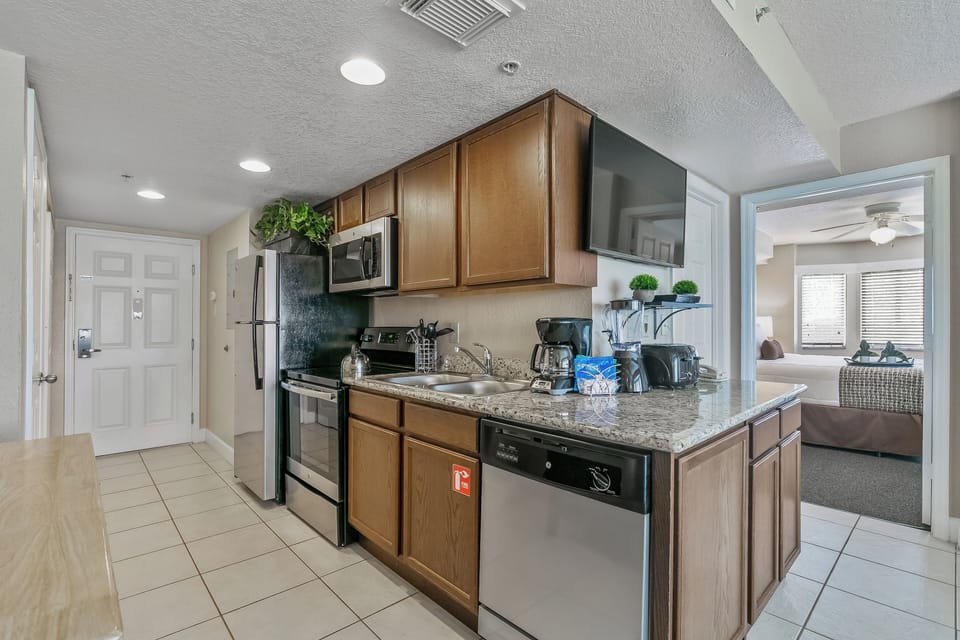 Microwave, coffee/tea maker, cookware/dishes/utensils