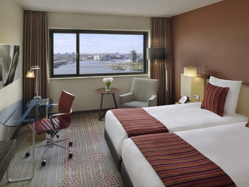 Hypo-allergenic bedding, in-room safe, desk, laptop workspace