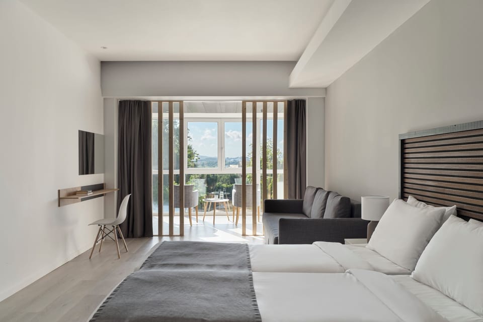 Junior Suite with Pool View | 1 bedroom, Select Comfort beds, in-room safe, soundproofing