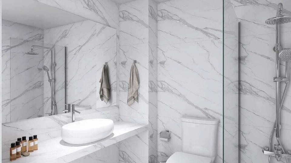 Combined shower/tub, free toiletries, hair dryer, slippers