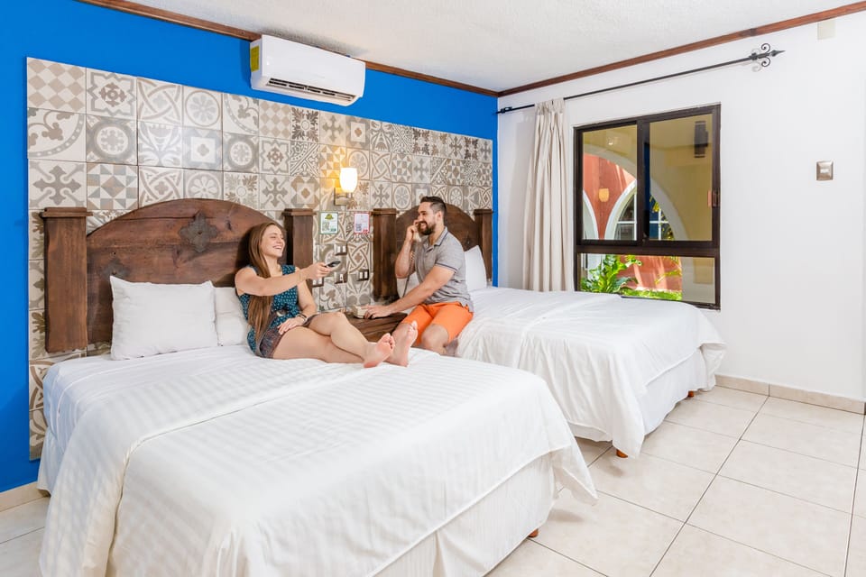 Standard Room, 2 Double Beds | In-room safe, WiFi (free)