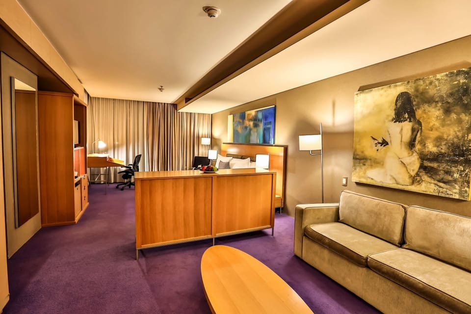 Junior Suite, 1 King Bed | Premium bedding, in-room safe, desk, blackout drapes