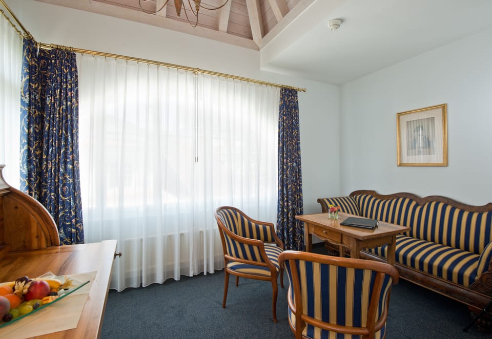 Deluxe Double or Twin Room | Living area | Flat-screen TV