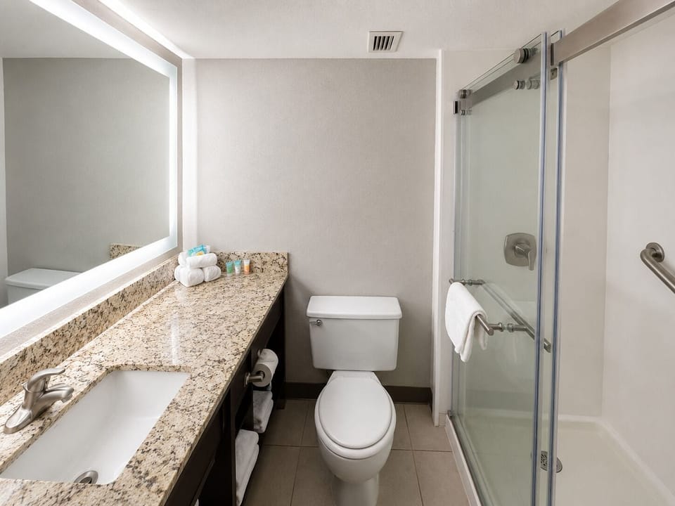 Designer toiletries, hair dryer, towels, soap