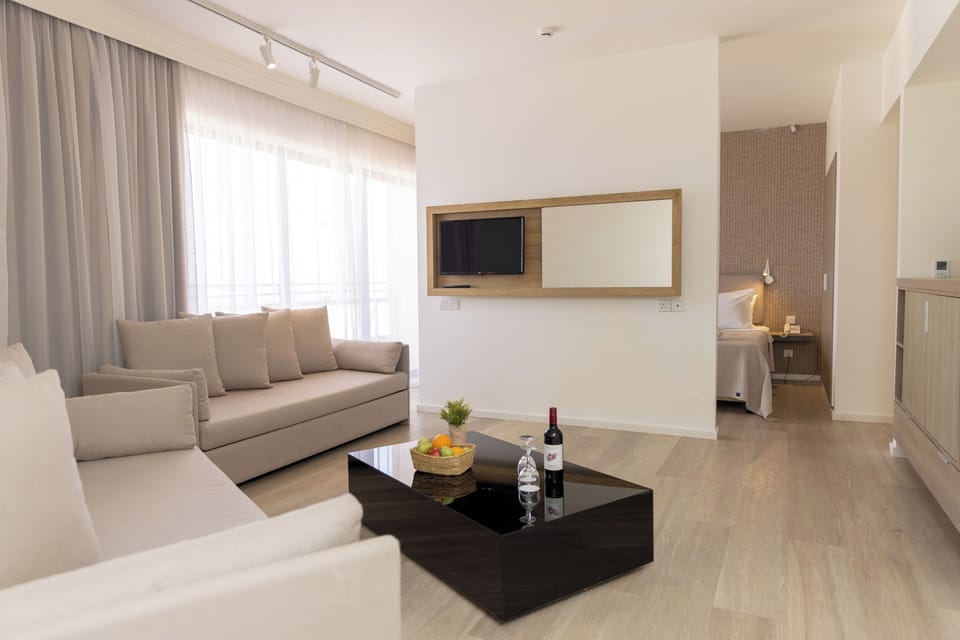 Venus Suite with Direct Sea View | Minibar, in-room safe, laptop workspace, blackout drapes