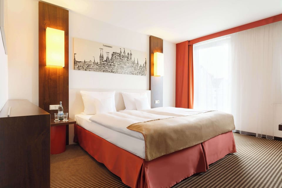 Hypo-allergenic bedding, in-room safe, desk, laptop workspace